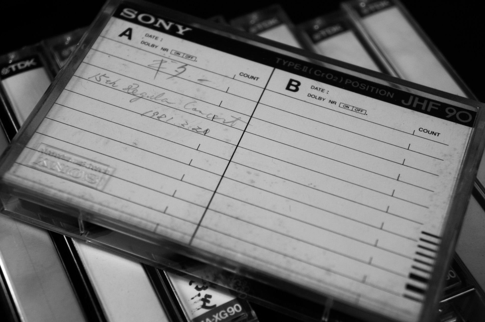 1981 年に録音されたクロムテープ。定期演奏会がまだ合唱部と吹奏楽部と合同だった時代